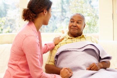 Woman looking after sick patient